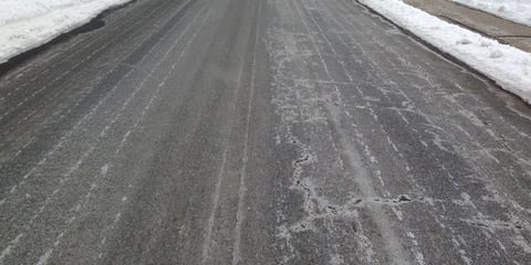 Road deicing treatment using salt brine