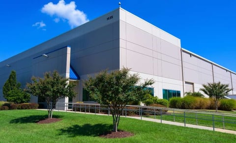 Industrial building landscape with trees