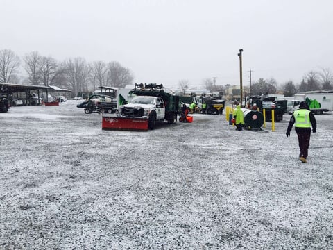 Level Green Landscaping snow removal workers and snow plows