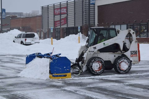 professional snow removal in parking lot