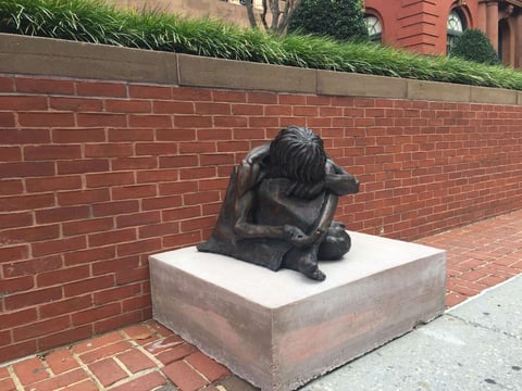 statue in front of cathedral